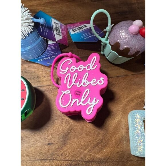 Lot of 6 hand sanitizer cases.   Good vibes, cupcake, penguin, melon - Picture 4 of 7